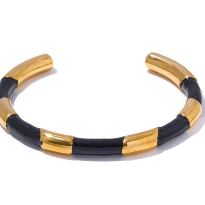 White & Black Enamel Cuffs