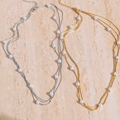 Gold Luna Layers – Triple Strand Pearl Necklace