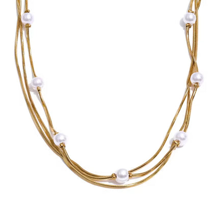 Gold Luna Layers – Triple Strand Pearl Necklace